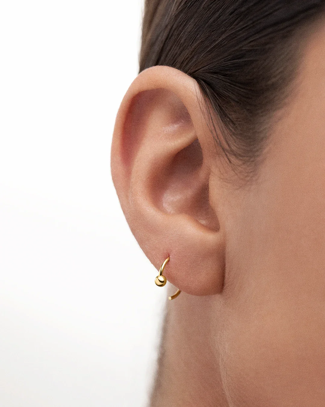 Pendiente Piercing Twist en Oro Amarillo de 18 Kt - Image 2